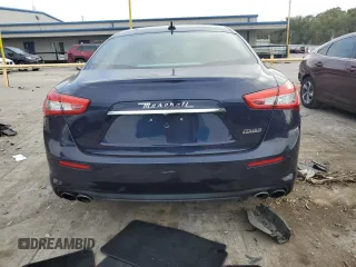 2018 Maserati Ghibli z VIN ZAM57XSA5J1287424, wystawiony jako Copart lot #71215154 z przebiegiem 20 029 mil mil oraz Szkoda całkowita • Salvage title. Historia ofert i sprzedaży dostępna na DreamBid. Obrazek 6.