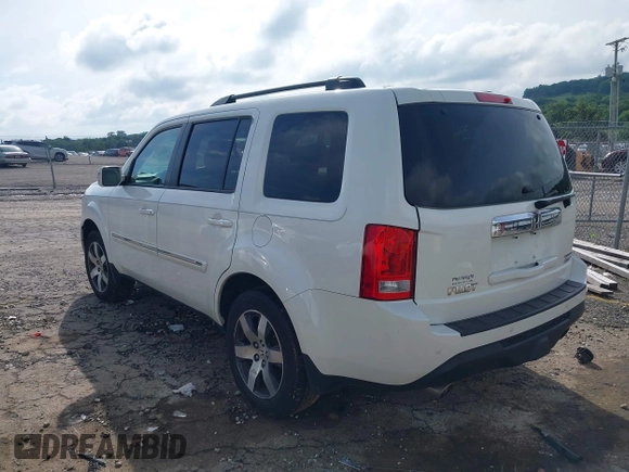 2013 Honda Pilot Touring z VIN 5FNYF4H99DB017351, wystawiony jako IAAI lot #42355167 z przebiegiem 122 191 mil mil oraz . Historia ofert i sprzedaży dostępna na DreamBid. Obrazek 3.