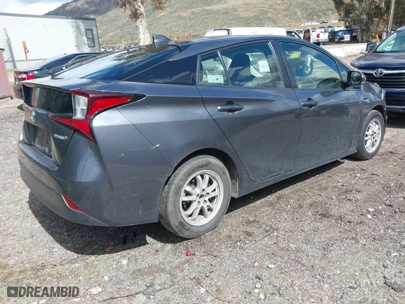 2020 Toyota Prius L Eco with VIN JTDKARFU8L3114786, listed as a IAAI auction lot 41804909 with 196,099 mi miles. Bid and sale history available at carsss.com. Image 4.