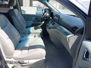 2005 Honda Odyssey TOURING with VIN 5FNRL38885B082482, listed as a IAAI auction lot 41879897 with 159,667 mi miles. Bid and sale history available at carsss.com. Image 5.