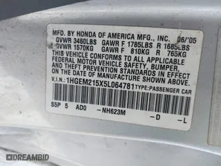 2005 Honda Civic LX with VIN 1HGEM215X5L064781, listed as a IAAI auction lot 41443405 with 303,293 mi miles. Bid and sale history available at carsss.com. Image 9.