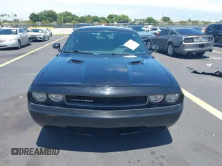 2012 Dodge Challenger SXT Plus с VIN 2C3CDYAG2CH181070, выставлен на аукционе IAAI как лот 42597826 с пробегом 94 634 миль миль и . История ставок и продаж доступна на DreamBid. Изображение 12.