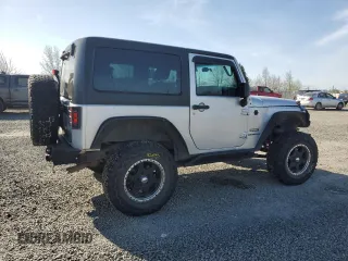 2012 Jeep Wrangler Sport z VIN 1C4AJWAG3CL151885, wystawiony jako Copart lot #51682175 z przebiegiem 111 544 mil mil oraz Szkoda całkowita • Salvage title. Historia ofert i sprzedaży dostępna na DreamBid. Obrazek 3.