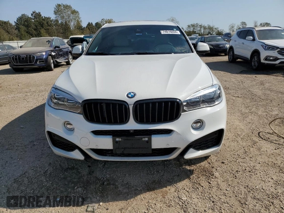 2018 BMW X6 xDrive50i with VIN 5UXKU6C56J0Z66652, listed as a Copart auction lot 74816694 with 56,229 mi miles and Salvage Title. Bid and sale history available at carsss.com. Image 5.