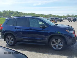 2020 Honda Passport Touring z VIN 5FNYF8H94LB015299, wystawiony jako IAAI lot #42064416 z przebiegiem 62 397 mil mil oraz . Historia ofert i sprzedaży dostępna na DreamBid. Obrazek 13.