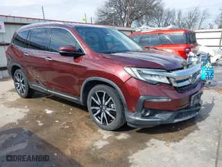 2019 Honda Pilot Touring 8-Passenger with VIN 5FNYF5H95KB009122, listed as a IAAI auction lot 41573338 with 85,845 mi miles. Bid and sale history available at carsss.com. Image 1.