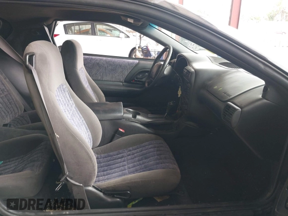 2002 Chevrolet Camaro z VIN 2G1FP22K822119358, wystawiony jako IAAI lot #42530943 z przebiegiem 98 277 mil mil oraz . Historia ofert i sprzedaży dostępna na DreamBid. Obrazek 5.