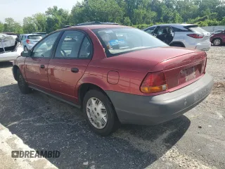 1999 Saturn SL z VIN 1G8ZH5288XZ273509, wystawiony jako Copart lot #55508215 z przebiegiem 168 946 mil mil oraz Szkoda całkowita • Salvage title. Historia ofert i sprzedaży dostępna na DreamBid. Obrazek 2.