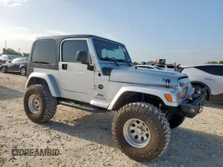 2005 Jeep Wrangler X с VIN 1J4FA39S45P353119, выставлен на аукционе Copart как лот 64206825 с пробегом 134 298 миль миль и Списание • Salvage title. История ставок и продаж доступна на DreamBid. Изображение 4.
