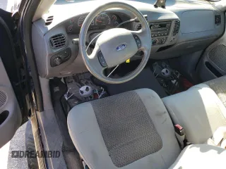 2003 Ford F-150 XL with VIN 1FTRF17L03NB45767, listed as a Copart auction lot 74489053 with 138,263 mi miles and Salvage Title. Bid and sale history available at DreamBid. Image 8.