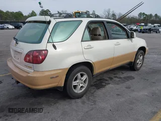 1999 Lexus RX 300 Luxury SUV with VIN JT6GF10U5X0038086, listed as a IAAI auction lot 41571366 with 214,094 mi miles. Bid and sale history available at carsss.com. Image 4.