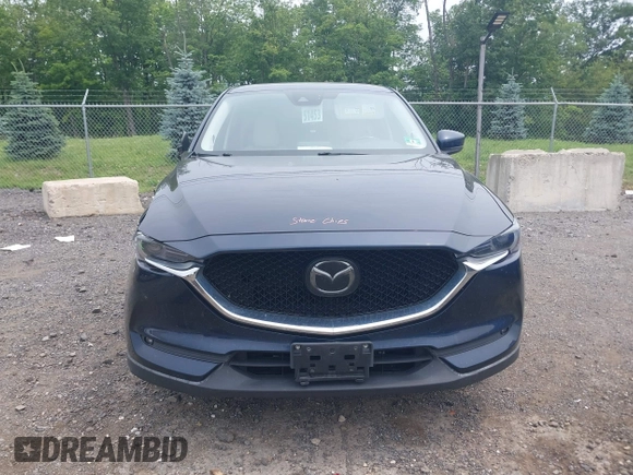 2018 Mazda CX-5 Grand Touring with VIN JM3KFBDMXJ0361812, listed as a IAAI auction lot 42509752 with 131,386 mi miles and . Bid and sale history available at DreamBid. Image 13.
