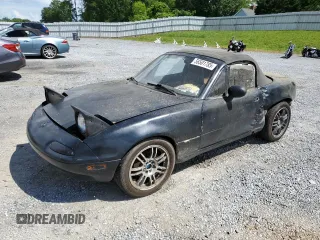 1995 Mazda MX-5 Miata with VIN JM1NA3538S0604115, listed as a Copart auction lot 56501785 with 213,563 mi miles and Salvage title. Bid and sale history available at DreamBid. Image 1.