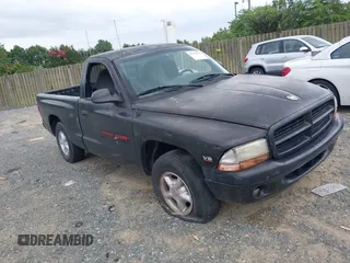 1998 Dodge Dakota SLT with VIN 1B7FL26X1WS735133, listed as a IAAI auction lot 42792296 with 200,000 mi miles and . Bid and sale history available at DreamBid. Image 1.