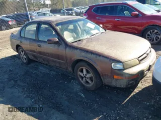 1998 Nissan Maxima GXE z VIN JN1CA21A0WT402950, wystawiony jako IAAI lot #41825084 z przebiegiem 244 042 mil mil oraz . Historia ofert i sprzedaży dostępna na DreamBid. Obrazek 1.
