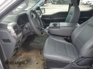 2021 Ford F-150 XL with VIN 1FTEX1CB8MKD88951, listed as a Copart auction lot 64674024 with 100,886 mi miles and Salvage title. Bid and sale history available at DreamBid. Image 7.