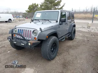 2013 Jeep Wrangler Unlimited Rubicon z VIN 1C4BJWFG7DL667083, wystawiony jako IAAI lot #42016912 z przebiegiem 148 933 mil mil oraz . Historia ofert i sprzedaży dostępna na DreamBid. Obrazek 17.