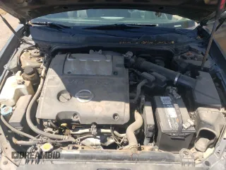 2005 Nissan Maxima SE z VIN 1N4BA41E45C805471, wystawiony jako Copart lot #58156355 z przebiegiem 184 521 mil mil oraz Szkoda całkowita • Salvage title. Historia ofert i sprzedaży dostępna na DreamBid. Obrazek 11.