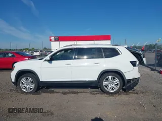 2018 Volkswagen Atlas SEL Premium with VIN 1V2NR2CA5JC571171, listed as a IAAI auction lot 42174807 with 131,690 mi miles and . Bid and sale history available at DreamBid. Image 14.