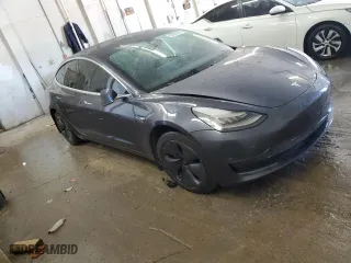 2019 Tesla Model 3 Long Range with VIN 5YJ3E1EB5KF453064, listed as a Copart auction lot 52287055 with 84,172 mi miles and Salvage Title. Bid and sale history available at carsss.com. Image 4.
