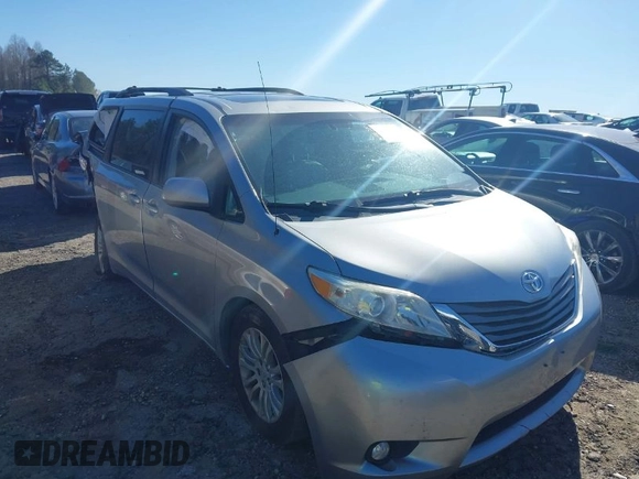 2011 Toyota Sienna XLE AAS with VIN 5TDYK3DC5BS039959, listed as a IAAI auction lot 41803881 with 129,479 mi miles. Bid and sale history available at carsss.com. Image 1.