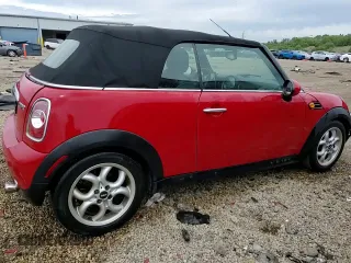 2012 MINI Convertible with VIN WMWZN3C58CT134224, listed as a Copart auction lot 57610015 with 141,394 mi miles and Salvage title. Bid and sale history available at DreamBid. Image 13.