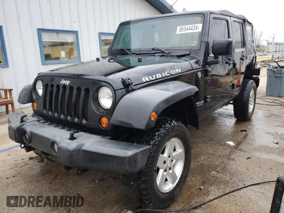 2007 Jeep Wrangler Unlimited Rubicon with VIN 1J8GA69147L113994, listed as a Copart auction lot 86544434 with 100,251 mi miles and Salvage title. Bid and sale history available at DreamBid. Image 1.