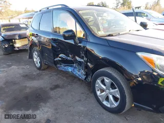 2015 Subaru Forester 2.5i Premium with VIN JF2SJADC2FH401318, listed as a IAAI auction lot 41451231 with 152,489 mi miles. Bid and sale history available at carsss.com. Image 6.