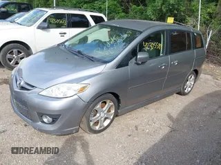 2010 Mazda 5 Sport with VIN JM1CR2W31A0384307, listed as a IAAI auction lot 42305589 with 144,372 mi miles and . Bid and sale history available at DreamBid. Image 2.