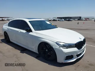 2016 BMW 7 Series 740i z VIN WBA7E2C50GG504050, wystawiony jako IAAI lot #42498517 z przebiegiem 79 427 mil mil oraz . Historia ofert i sprzedaży dostępna na DreamBid. Obrazek 1.