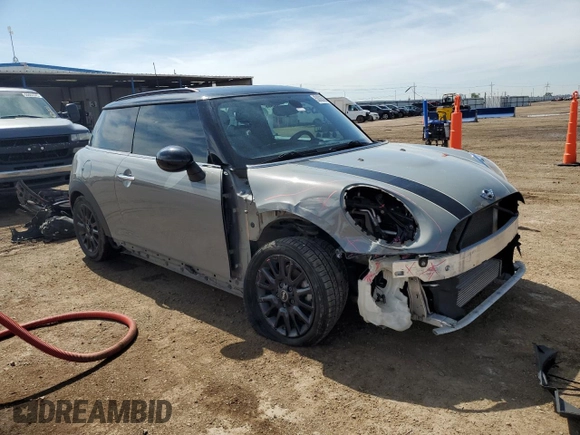 2015 MINI Hardtop with VIN WMWXM5C5XFT974077, listed as a Copart auction lot 58063965 with 93,853 mi miles and Salvage title. Bid and sale history available at DreamBid. Image 4.