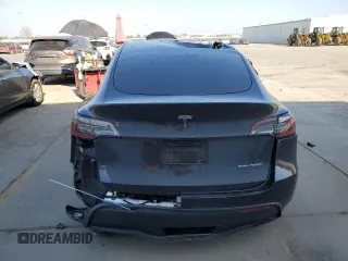 2024 Tesla Model Y Long Range with VIN 7SAYGDEE6RF063230, listed as a Copart auction lot 42872535 with Not Provided miles and Salvage Title. Bid and sale history available at DreamBid. Image 6.