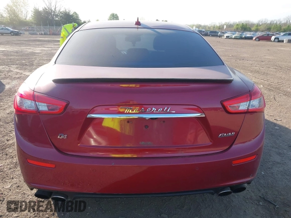 2014 Maserati Ghibli S Q4 z VIN ZAM57RTA1E1126505, wystawiony jako IAAI lot #42115267 z przebiegiem 90 760 mil mil oraz . Historia ofert i sprzedaży dostępna na DreamBid. Obrazek 16.