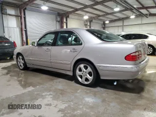 2002 Mercedes-Benz E-Class with VIN WDBJF65J52B497463, listed as a Copart auction lot 82372014 with 201,131 mi miles and Salvage Title. Bid and sale history available at carsss.com. Image 2.