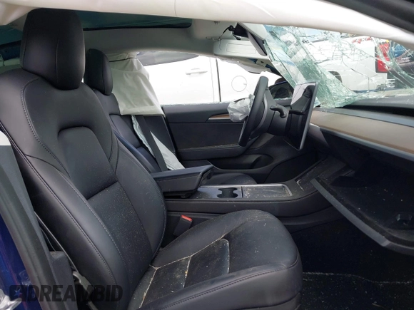 2023 Tesla Model 3 z VIN 5YJ3E1EA8PF403743, wystawiony jako IAAI lot #42076747 z przebiegiem 58 399 mil mil oraz . Historia ofert i sprzedaży dostępna na DreamBid. Obrazek 5.