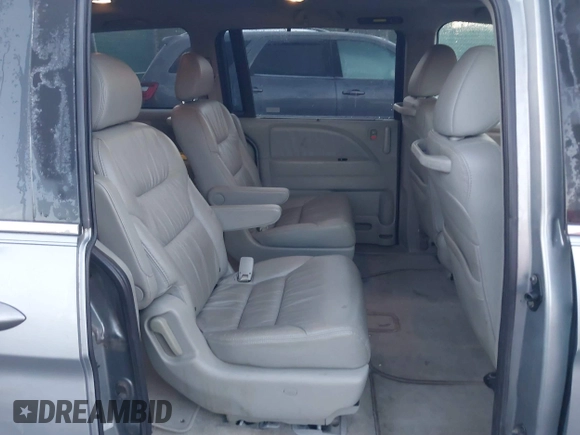 2009 Honda Odyssey EX-L with VIN 5FNRL387X9B005030, listed as a IAAI auction lot 41775144 with 155,531 mi miles. Bid and sale history available at carsss.com. Image 8.
