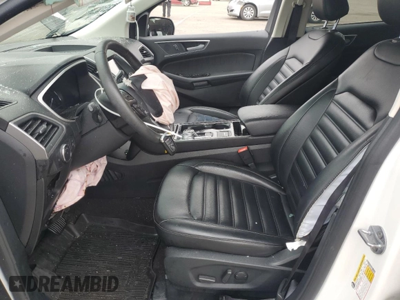 2020 Ford Edge SEL z VIN 2FMPK4J9XLBB30184, wystawiony jako Copart lot #56839925 z przebiegiem 38 563 mil mil oraz Szkoda całkowita • Salvage title. Historia ofert i sprzedaży dostępna na DreamBid. Obrazek 7.