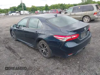 2019 Toyota Camry LE z VIN 4T1B11HK2KU738133, wystawiony jako IAAI lot #42499213 z przebiegiem 203 636 mil mil oraz . Historia ofert i sprzedaży dostępna na DreamBid. Obrazek 3.