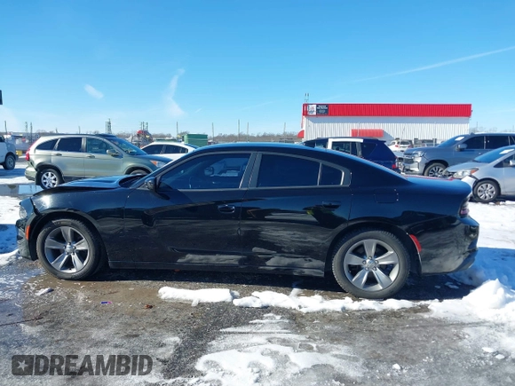 2015 Dodge Charger SXT with VIN 2C3CDXHG5FH841090, listed as a IAAI auction lot 41293591 with 107,732 mi miles and . Bid and sale history available at DreamBid. Image 14.