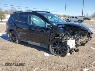 2018 Toyota RAV4 XLE with VIN 2T3RFREV2JW804022, listed as a Copart auction lot 87150944 with Not Provided miles and Salvage Title. Bid and sale history available at DreamBid. Image 4.