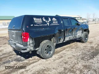 2015 Chevrolet Silverado 1500 LT with VIN 1GCVKREC3FZ332669, listed as a IAAI auction lot 41680418 with 106,095 mi miles and . Bid and sale history available at DreamBid. Image 4.