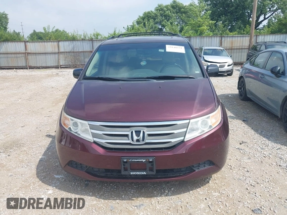 2011 Honda Odyssey EX-L with VIN 5FNRL5H6XBB096891, listed as a IAAI auction lot 42840531 with 214,842 mi miles and . Bid and sale history available at DreamBid. Image 13.