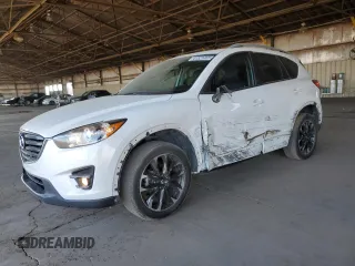 2016 Mazda CX-5 Grand Touring with VIN JM3KE2DY9G0653904, listed as a Copart auction lot 41521465 with 89,764 mi miles and Salvage Title. Bid and sale history available at carsss.com. Image 1.