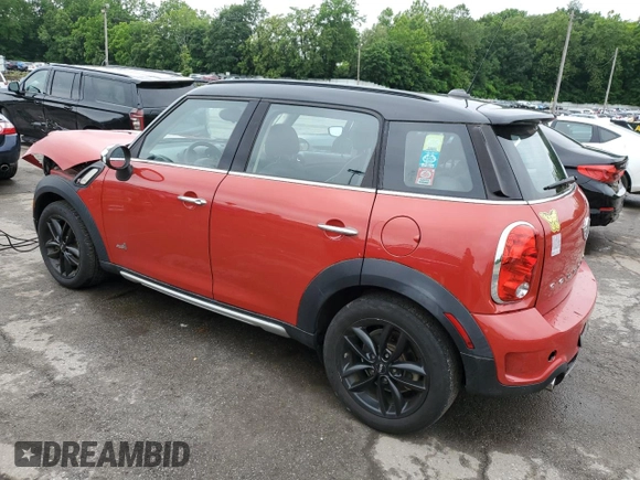 2015 MINI Countryman S with VIN WMWZC5C54FWP42858, listed as a Copart auction lot 60684185 with 83,163 mi miles and Salvage title. Bid and sale history available at DreamBid. Image 2.