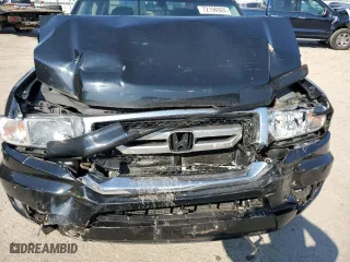 2011 Honda Ridgeline RTL with VIN 5FPYK1F57BB451119, listed as a Copart auction lot 72196924 with 114,736 mi miles and Salvage Title. Bid and sale history available at carsss.com. Image 13.