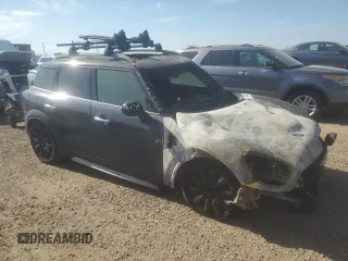 2017 MINI Countryman Cooper with VIN WMZYS7C30H3E06885, listed as a Copart auction lot 61150455 with Not provided miles and Salvage title. Bid and sale history available at DreamBid. Image 4.