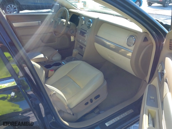 2007 Lincoln MKZ with VIN 3LNHM26T07R653177, listed as a IAAI auction lot 41571111 with 124,929 mi miles. Bid and sale history available at carsss.com. Image 5.