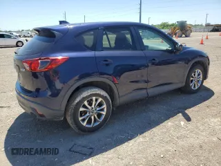 2014 Mazda CX-5 Touring with VIN JM3KE2CY7E0362879, listed as a Copart auction lot 53079545 with 70,863 mi miles and Salvage Title. Bid and sale history available at carsss.com. Image 3.