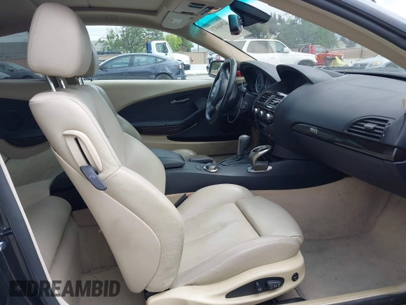 2006 BMW 6 Series 650Ci with VIN WBAEH13436CR50523, listed as a IAAI auction lot 42046873 with 111,765 mi miles. Bid and sale history available at carsss.com. Image 5.