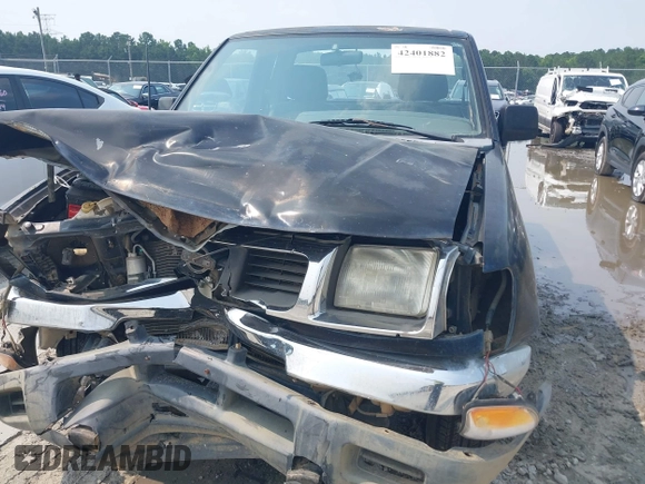 1998 Nissan Frontier XE with VIN 1N6DD26S4WC358779, listed as a IAAI auction lot 42401882 with Not provided miles and . Bid and sale history available at DreamBid. Image 6.